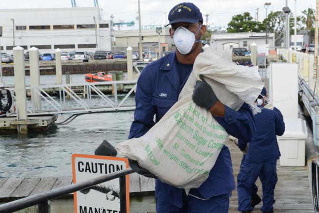 The Coast Guard offloads an estimated $1.9 million of marijuana contraband in Miami, Florida (Coast Guard News / Creative Commons)