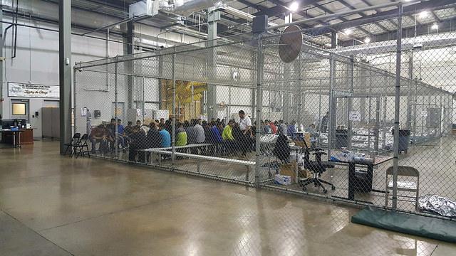 Border Patrol agents conduct intake of undocumented border crossers at the Central Processing Center in McAllen, Texas, on June 17, 2018. (U.S. Customs and Border Patrol)