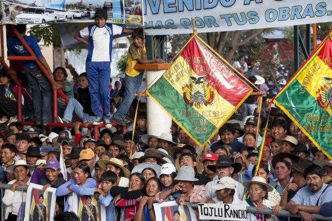 Supporters listen to Evo Morales speak in Cliza, Bolivia on July 6, 2013. (Photo by Dominic Chavez/World Bank via Flickr)