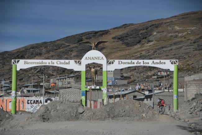 The sign on the entrance to Ananea, a squatter city that houses workers in a region filled with informal mines, reads, “Welcome to the Golden City of the Andes.” (Heather Williams)