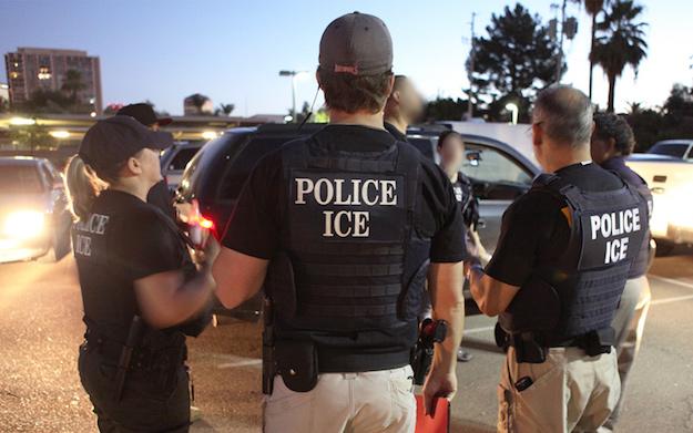 ICE officers arrest undocumented immigrants during a wave of deportations in 2011. (U.S. Immigration and Customs Enforcement)