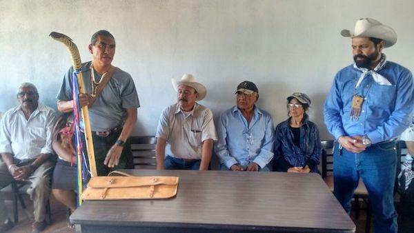 Salt pilgrimage leader Ken Josemaria holds the O'odham ceremonial staff at their sacred site in Sonora, Mexico. (Tohono O'odham Men's Salt Pilgrimage)