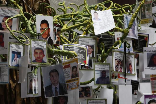 A demonstration by the families of the Ayotzinapa victims on the International Day of the Victims of Forced Disappearances in 2017 (Inter-American Commission on Human Rights / Flickr / CC BY 2.0)