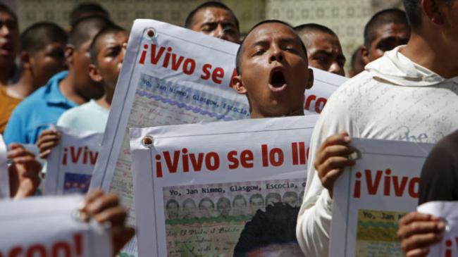 Family members and supporter are still fighting for justice for the 43 disappeared Ayotzinapa students three years after they went missing in Iguala, Guerrero. (Photo by Ginnette Riquelme/CIDH/Flickr)