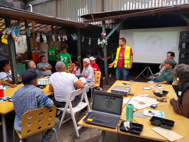 A representative from a waste picker collective in Paris and member of the Global Alliance leads a workshop with canners at Sure We Can, September 2019 (Photo by Taylor Cass Talbott)