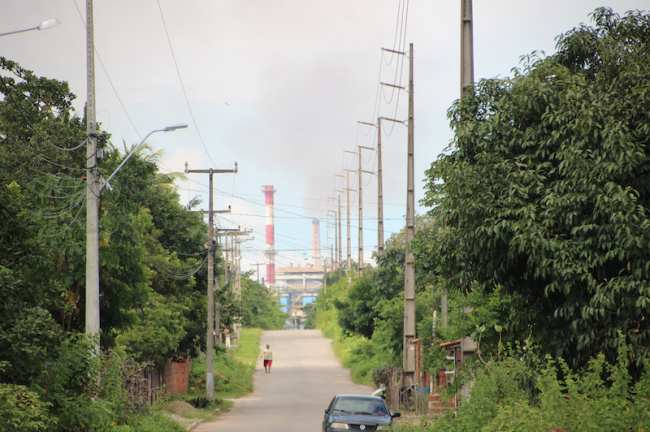 Smokestacks at the coal-burning Steel Company of Pecem (CSP) release carbon, sulfur dioxide, and nitrogen oxide emissions during a 2023 site visit. (Patricia Rodriguez / Earthworks)