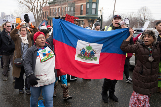 Haitian immigrants protest the Trump administration's immigration policies in St. Paul, Minnesota, January 20, 2018. (Fibonacci Blue / CC BY 2.0)