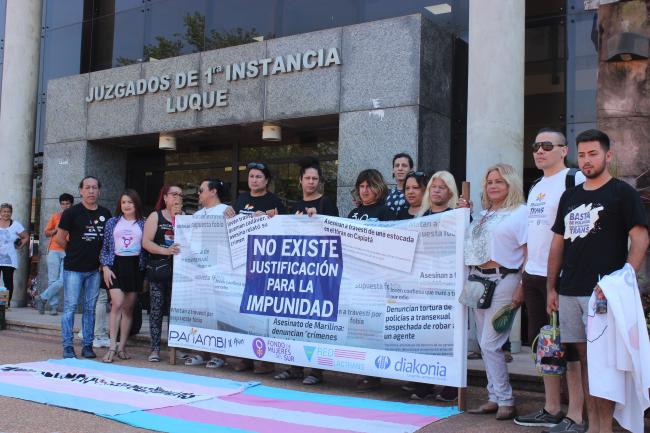 Activists outside court on the day of the trial (Photo by William Costa)