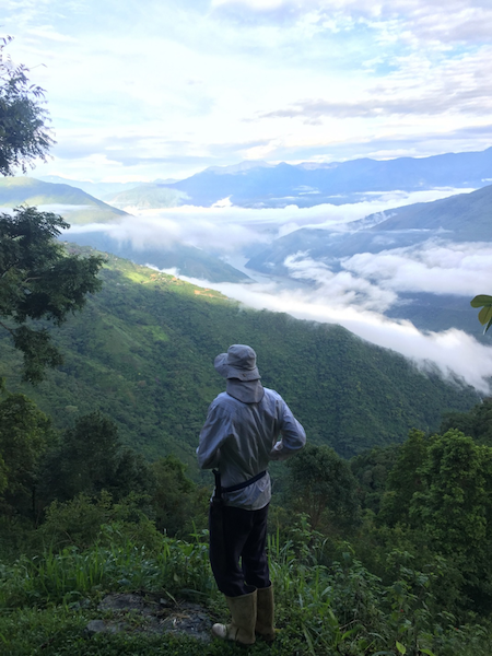 A man overlooks the Cauca river valley in Briceño (Photo by Alex Diamond)