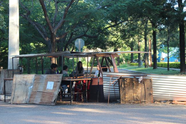 Students at one of the multiple barricades set up across the campus during the occupation to control access. (William Costa)