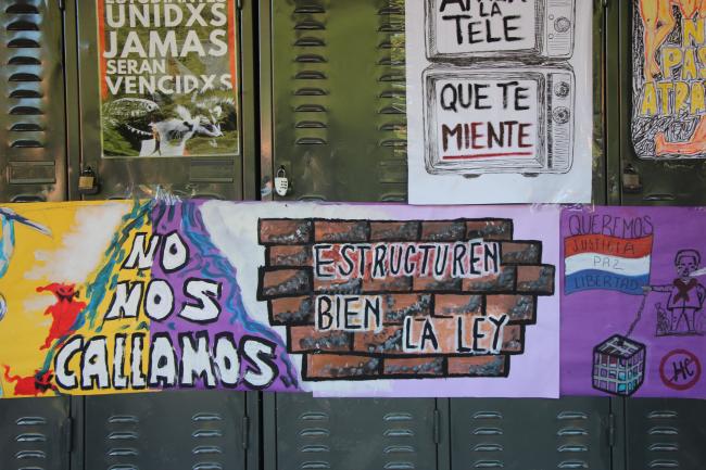 Protest posters at the National University of Asunción's Faculty of Architecture, Design and Art. (William Costa)