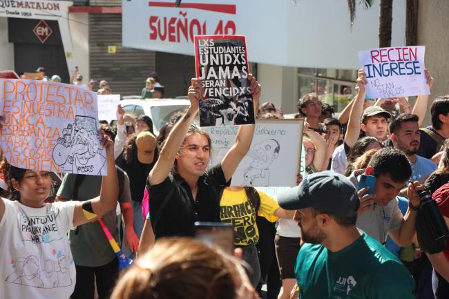 Students participate in an International Workers' Day march in central Asunción on May 1. Chants of 