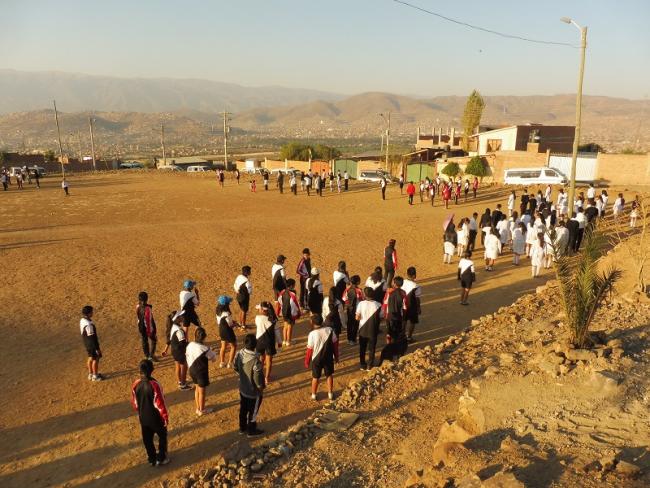 High school students in Alto Buena Vista, a low-income barrio of Cochabamba, practice for their August 6 parade in 2017 (Photo: Amy Booth).