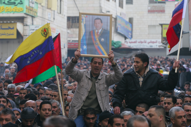 Venezuelan flags and a portrait of Hugo Chávez feature prominently at a demonstration in Ramallah, Palestine, 2009. (Issam Rimawi)