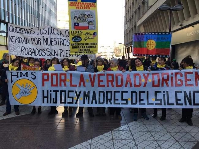 A photo of members of Hijos y Madres del Silencio (Children and Mothers of Silence), an organization in Chile that lodges complaints for irregular adoptions and helps with family reunifications (Photo courtesy of Hijos y Madres del Silencio)