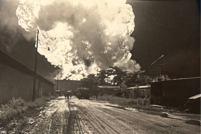 An explosion at the port of Corinto, Nicaragua, during an attack by Contra group Fuerza Democrática Nicaraguense on a petroleum tank, 1983. (Carlos Chavarria / Nueva Imagen / NACLA archives)