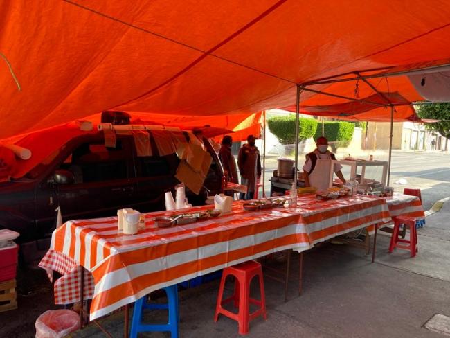 Eleuterio Pulido Ramirez at his barbacoa stand in November 2020. He has been a community fixture in Iztapalapa for 40 years. (Humberto Juarez Rocha)