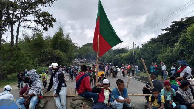 Minga protesters blocking a road. (Consejo Regional Indígena del Cauca CRIC)