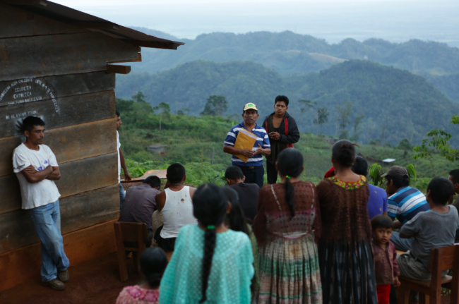 Rodrigo Tot (center) speaks with Agua Caliente community members. (Goldman Environmental Prize)