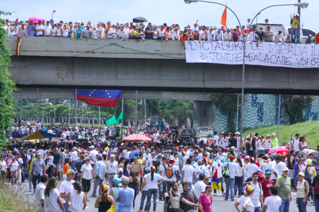 An opposition march on October 26, 2016, during a wage of anti-government protests. Opposition leaders gave Nicol?s Maduro a 